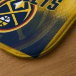 denver-nuggets-pixel-blur-blue-doormat-best-selling.webp