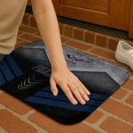 new-orleans-pelicans-chevron-points-navy-black-doormat-best-selling.webp
