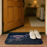 new-orleans-pelicans-tribal-detailing-navy-black-doormat-best-selling.webp
