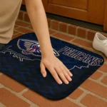 new-orleans-pelicans-tribal-detailing-navy-black-doormat-best-selling.webp