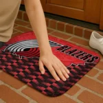 portland-trail-blazers-tribal-detailing-red-black-doormat-best-selling.webp